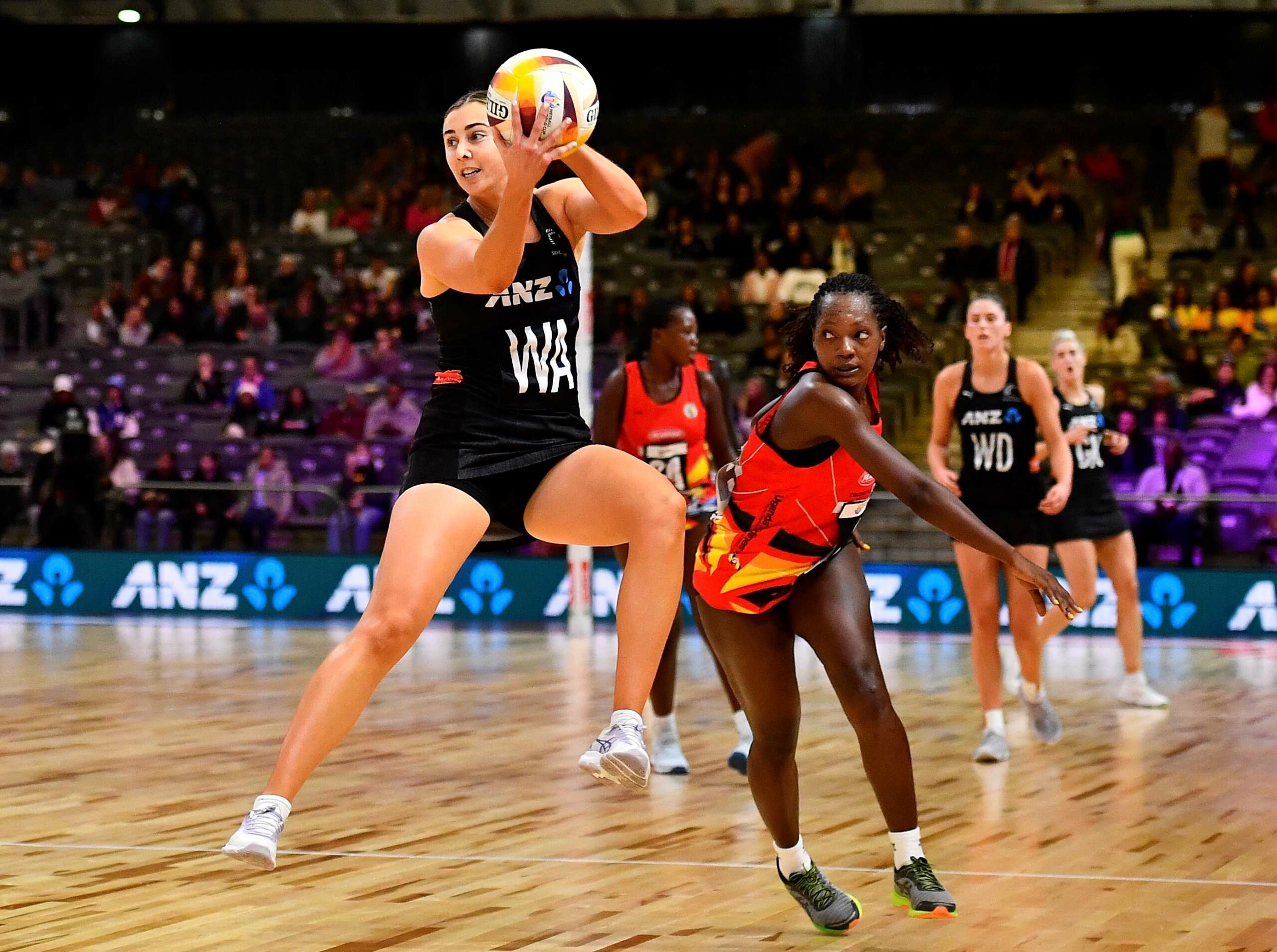 Featured image for “Fiji upset Zimbabwe as New Zealand, Australia and Jamaica progress through second group matches”